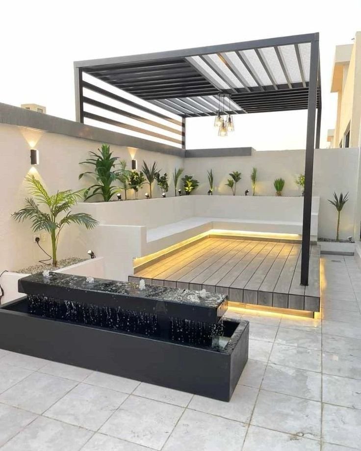 برجولة حديد مودرن مع سقف لكسان وجلسة مرتفعة.